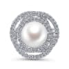 This 14k white gold diamond ring features a pearl swimming in the center of a swirling diamond halo. - Image 1 of 0