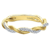 This unique 14k yellow gold diamond twist ring features 0.20 carats of diamonds. - Image 1 of 0