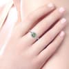 This delicate dandy features 14k white gold leading up to a peridot with a round diamond halo in this 14k white gold diamond gemstone ring. - Image 2 of 0