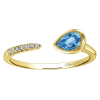 This swiss blue topaz ring features an open design with gorgeous diamonds laid over 14k yellow gold. - Image 4 of 0