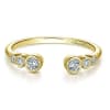 This 14k yellow gold diamond stackable ring features 6 round bezel set diamonds. - Image 1 of 0