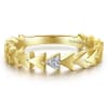 This 14k yellow gold pyramid diamond stackable ring features diamond accents. - Image 1 of 0