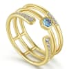 This 14k yellow gold ring is stacked with blue topaz and diamonds. - Image 4 of 0