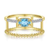 This uniquely styled 14k yellow gold diamond and blue topaz ring features beaded 14k yellow gold. - Image 1 of 0