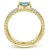 This uniquely styled 14k yellow gold diamond and blue topaz ring features beaded 14k yellow gold. - Image 2 of 0