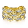 14k yellow gold braids twist in diamonds in this 14k yellow gold diamond ring. - Image 1 of 0