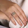 14k yellow gold braids twist in diamonds in this 14k yellow gold diamond ring. - Image 2 of 0
