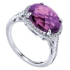 Nearly one quarter carats of round brilliant diamonds in a halo surround a center purple amethyst in this classic and unique 14k white gold gemstone ring. - Image 3 of 0