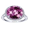 Nearly one quarter carats of round brilliant diamonds in a halo surround a center purple amethyst in this classic and unique 14k white gold gemstone ring. - Image 4 of 0