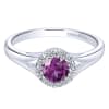 A gorgeous purple amethyst sits neatly in a halo of high quality round diamonds in this 14k white gold gemstone and diamond ring. - Image 1 of 0