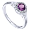 A gorgeous purple amethyst sits neatly in a halo of high quality round diamonds in this 14k white gold gemstone and diamond ring. - Image 3 of 0