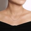Stylish rose gold showcases 0.20 carats in round brilliant diamonds in this naturally curving bar necklace. - Image 3 of 0