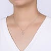 This 14k white gold diamond necklace features round brilliant diamonds in an open pear drop setting. - Image 3 of 0