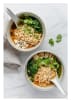 A bowl of yam noodles angel hair, served with vegetables and a savory sauce for a healthy plant-based meal - Image 3 of 0
