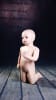 Fleshtone fiberglass toddler mannequin in a kneeling pose with realistic facial features for countertop retail display. - Image 3 of 0