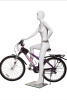 Female cyclist bike riding mannequin in glossy white resting pose for athletic apparel and cycling retail display - Image 4 of 0