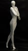 Glossy white female egghead mannequin in a walking pose standing on a square metal base with an ankle rod support. - Image 2 of 0