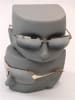 Set of four gunmetal gray female split face forms made of fiberglass for stackable retail sunglasses display. - Image 1 of 0