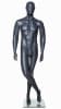 Grey fiberglass male mannequin with soft facial features in a standing crossed-leg pose on a metal base. - Image 1 of 0
