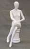 Seated matte white female fiberglass mannequin with left leg crossed sitting on a white stool base. - Image 1 of 0