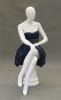 Seated matte white female fiberglass mannequin with left leg crossed sitting on a white stool base. - Image 2 of 0