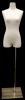 Female 3/4 white linen mannequin form with brushed metal rectangular floor base and adjustable height pole for retail clothing displays. - Image 1 of 0