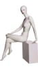 Seated abstract female mannequin in a leaned-back pose with crossed legs, featuring a matte cream finish, red lips, and a round glass base. - Image 2 of 0