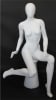 Female egghead mannequin in seated pose. Her legs are crossed with her hands on her lap. - Image 2 of 0