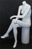 Matte white female headless fiberglass mannequin sitting in a cross-leg pose with hands on lap for boutique and retail clothing displays. - Image 2 of 0