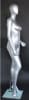 Metallic silver contemporary egg face female mannequin with right leg out pose, fiberglass construction, tempered glass base, and support rods - Image 5 of 0