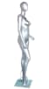 Metallic silver contemporary egg face female mannequin with right leg out pose, fiberglass construction, tempered glass base, and support rods - Image 6 of 0