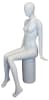 Matte white female seated mannequin with egghead design, fiberglass construction, and hands positioned to the side for apparel displays - Image 2 of 0