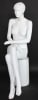 Seated white female mannequin with molded hair, matte fiberglass finish, and crossed-leg pose for apparel displays - Image 2 of 0