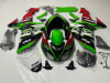 2006-2007 Kawasaki ZX-10R motorcycle fairings kit in green, black, red, and white with Monster Energy and Ninja decals, full replacement bodywork set. - Image 1 of 0