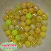 12mm Mixed Style Yellow Faux Pearl Beads sold in packages of 50 beads - Image 1 of 0