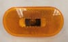 The Command Electronics 003-53P is an incandescent amber clearance light with a polar white housing, widely used for recreational vehicles, trailers, and trucks. - Image 1 of 0