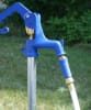 The Camco 22484 Water Bandit allows users to connect a standard hose to most standard-sized water sources that lack threads or have damaged threads, helping to prevent water waste. It features a flexible silicone-polymer sleeve. - Image 2 of 0