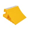 The Camco (44492) Super Wheel Chock is a single, large, yellow wheel chock made of durable plastic designed to keep a trailer securely in place. It is suitable for use with tires up to 29 inches in diameter. - Image 1 of 0