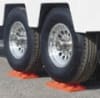 The Tri-Lynx 00015 Lynx Levelers are a set of 10 interlocking blocks used to level and stabilize a recreational vehicle (RV), trailer, or camper. They are designed to withstand significant weight and can be stacked to achieve the desired height. - Image 3 of 0