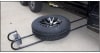 The BAL 28218B Hide-A-Spare Tire Storage system, is designed to mount a spare tire beneath an RV or travel trailer with an enclosed underbelly. - Image 3 of 0
