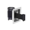 RECESSED WALLPRO flush mount retractable belt barrier installed discreetly in a white corridor wall cavity, showing only the flat, powder coated face plate when the belt is retracted. - Image 1 of 0
