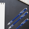 Trendy blue high-shine metallic ballpoint pen with Hilton Garden Inn logo. - Image 1 of 0