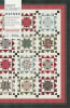 The cover of this pattern shows a straight set star quilt with a cream ground with scrappy stars of many colors and could easily be sewn to look vintage, modern, holiday, pastel or more. - Image 1 of 0