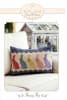 This is a small wool applique pillow featuring a design of five bunnies in Easter colors. - Image 1 of 0