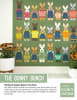The Bunny Bunch Quilt Pattern by Elizabeth Hartman shows a bevy of bunnies of all different sizes, some tall, some small. - Image 1 of 0