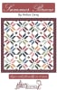 Summer Breeze Quilt Pattern by Melissa Corry shows a pretty quilt in scrappy colors with blocks that look like petals with a center square. - Image 1 of 0
