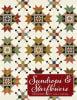Sundrops & Starflowers Quilt Pattern  by Kim Diehl shows a starflower block quilt with a a center star block. - Image 1 of 0