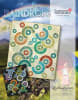 Raindrops Quilt Pattern by Judy Niemeyershows a multicolored starburst quilt with a dark and with a light background color. - Image 1 of 0