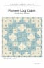 Pioneer Log Cabin Quilt Pattern  by Laundry Basket Quilts shows small log cabin blocks in shades of blue and cream with a narrow outer floral border. - Image 2 of 0