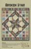 Broken Star Quilt Pattern from Nancy Rink Designs features a large center medallion star, combined with star and log cabin blocks and a scrappy piano key border in a colorful array of colors. - Image 1 of 0